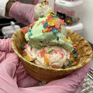 Three scoop sundae with fruity pebbles as the toppings