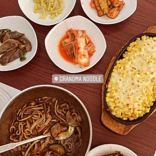 Korean Black Bean Noodles, corn cheese, alllll the side dishes