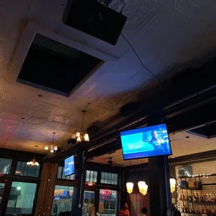 a television in a bar