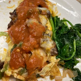 Steak omelette with sautéed spinach! Excellent!