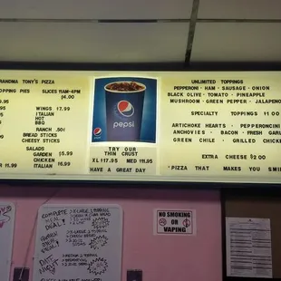 Current board menu. The online menu is a lot clearer and seems to have different pricing for some items like extra toppings.