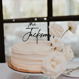 Sign &amp; florals added by us, cake from Grandma&apos;s Bakery!