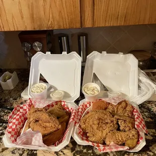two baskets of fried chicken