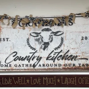 a sign with a cow