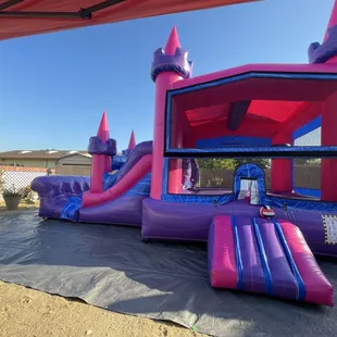 Pink castle combo available for your next party. Call or text 909-702-9797 to reserve today!