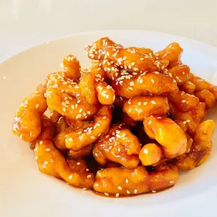 Indulge in the sweet and sour flavors of our signature Sweet and Sour Pork. Enjoy tender pork strips coated in a delectable sauce that perfe