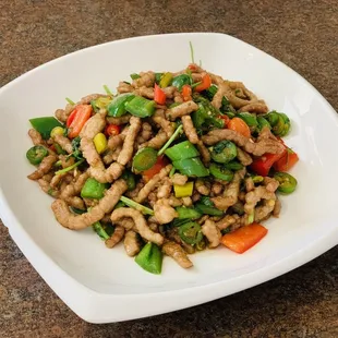 a plate of stir fried food
