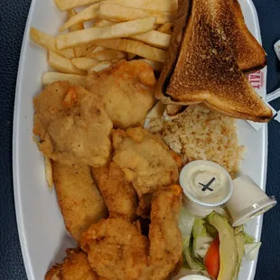 a plate of fried fish and fries