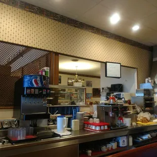 a woman standing at the counter