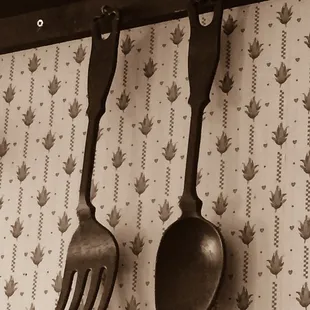 utensils hanging on a wall