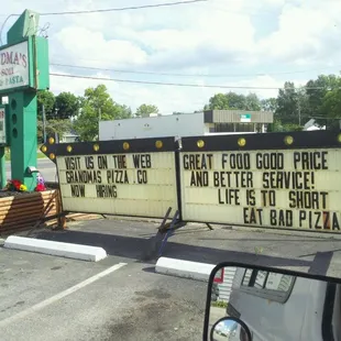 a sign in a parking lot