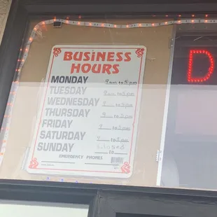 a business hours sign
