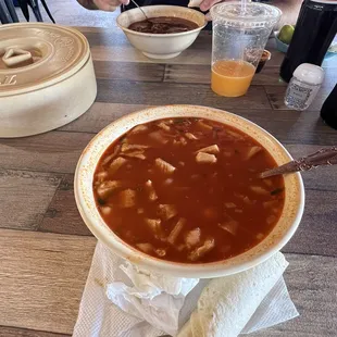 Menudo, 3 Corn Handmade Tortillas and fresh squeezed orange juice.