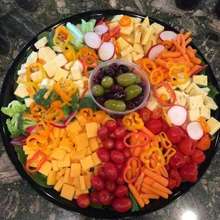 We make custom party trays!! Catering available. Parties.