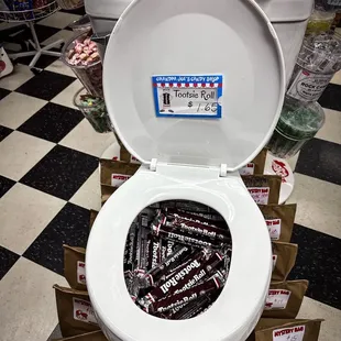 a toilet filled with candy