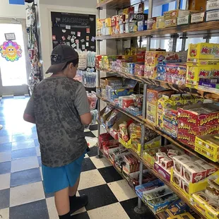 a woman shopping for candy