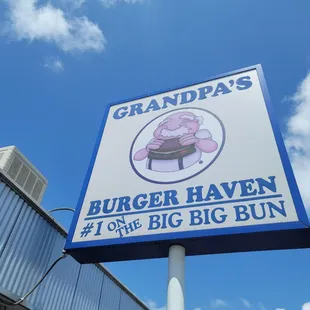 a sign for grandpa&apos;s burger haven