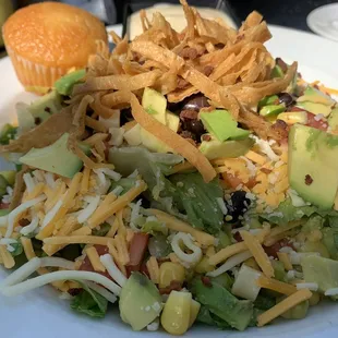 Very tasty chopped salad. Fresh chunks of avocado, crispy tortilla strips, beans, corn and juicy tomatoes.