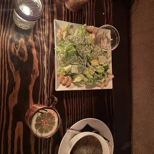a plate of salad and a bowl of soup