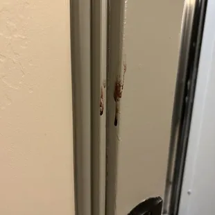 Mystery substance on trim of elevator.