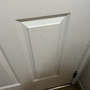 Crayon on door from previous guest.