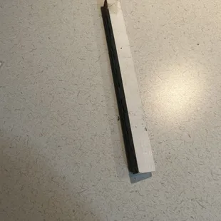 Piece of trim from beneath the kitchenette.
