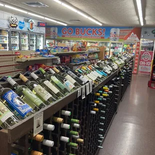 a wine rack in a grocery store
