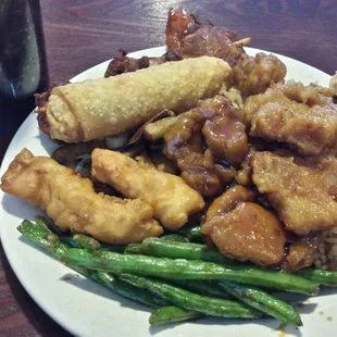 Green beans/three different types of chicken/ fried rice/ egg roll