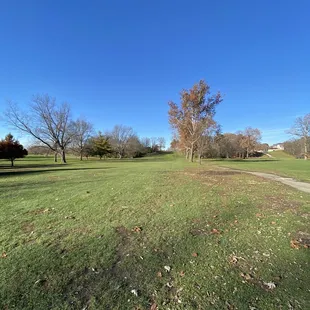 10th hole on right. Tee shot is elevated really nice hole. 11th hole on left green is elevated.