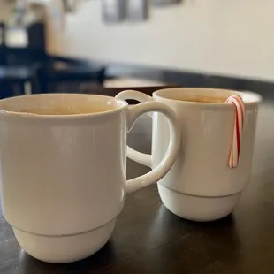 two cups of coffee on a table