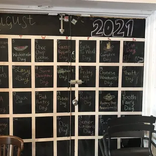 A cool wall calendar but it needs to be updated for September.