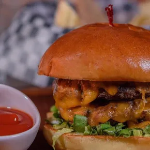 A 4 in 1 black angus burger: brisket, chuck, ribeye, and short rib.  Best in town!