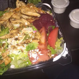 Apparently this is what a $10 Greek chicken salad is supposed to look like . Sans olives and peppers per my request. Poor ass salad