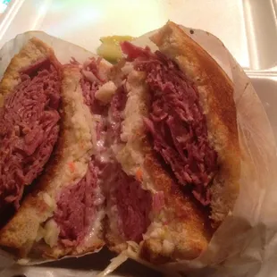 Grilled Reuben on rye with coleslaw and Swiss! Look at that meat!