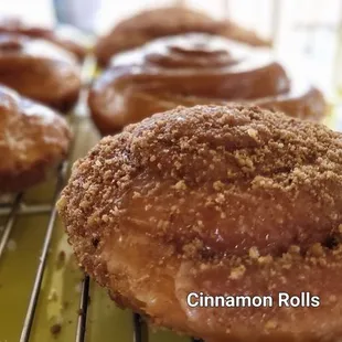cinnamon rolls on a cooling rack