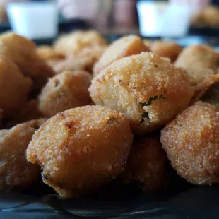 a plate of fried tater tots