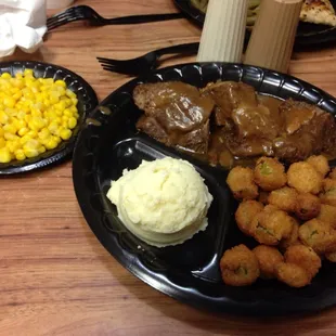 Roast beef mashed potatoes corn and fried okra