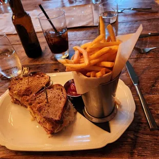 Reuben sandwich with fries. Was told it was good. I sampled a French fry and liked it. December 2023