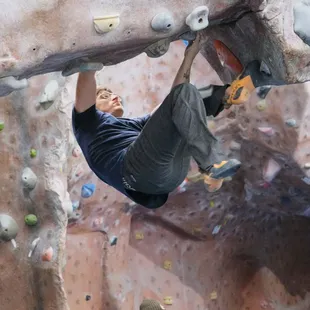 Climbing the arch in the Boulder Room.
