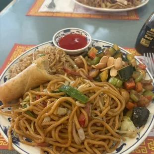 Egg roll, almond chicken, pork fried rice and chow mein.