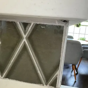 Grout coming out of the tile.
