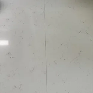 Hole and uneven seam in quartz.
