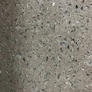 This Quartz slab is a million times more brilliant to view in person.