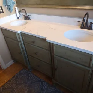 New granite top, sinks and fixtures