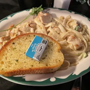 a plate of pasta and chicken