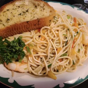 a plate of pasta and bread