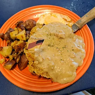 Country fried steak, country potatoes, eggs