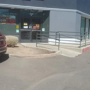 a car parked in front of the store