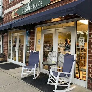 two rocking chairs outside