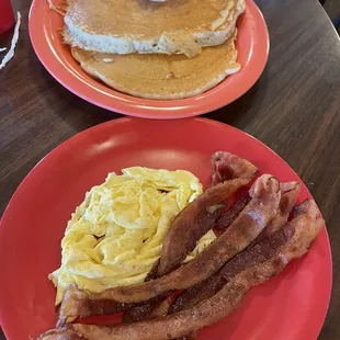 Pancakes, scrambled eggs and bacon